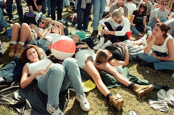 Fans watching Oasis in concert at Knebworth, Hertfordshire. 11th August 1996
