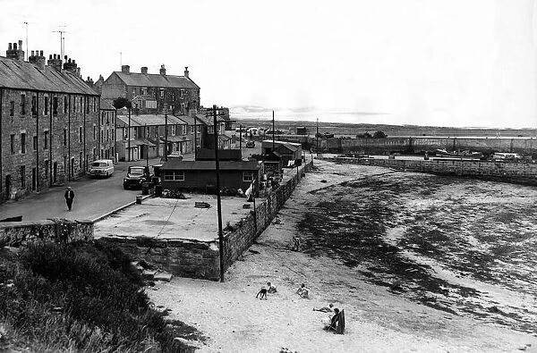 Far from the crowded beaches, this peaceful scene at the coastal village of Seahouses 11