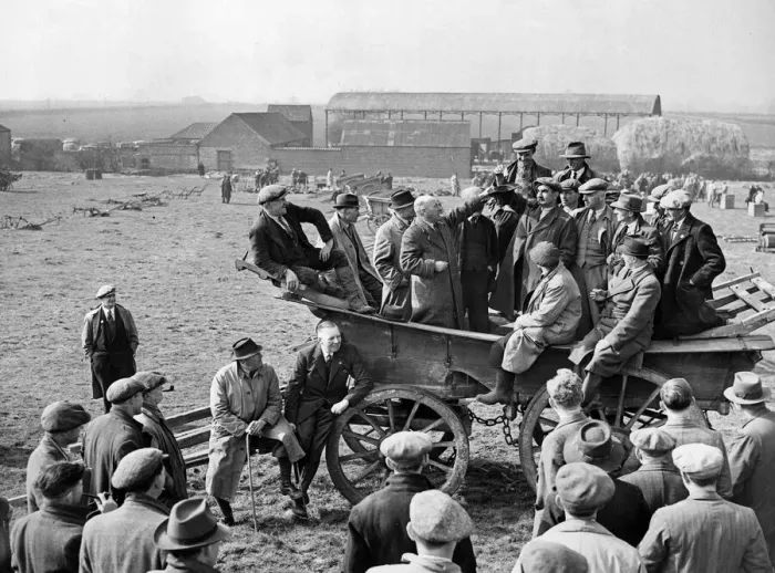 Framed Print : Farmers balloting for farm implements during the Second World War. 21st March 1943 Framed Print : Farmers balloting for farm implements during the Second World War. 21st March 1943