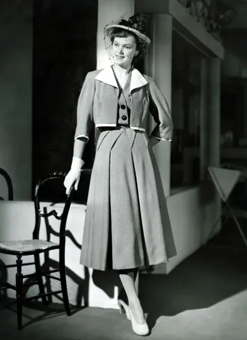 Framed Print : Fashion 1940s Model wearing a Bolero Pleated skirt suit