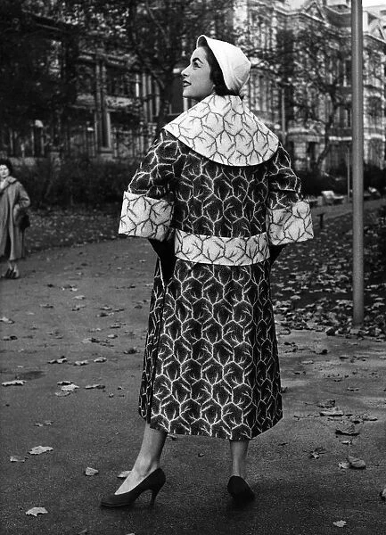 Fashion 1950 s: 'Sophisticate'is the name of this raincoat which was among