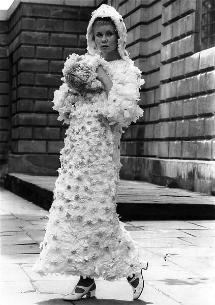 Fashion 1960s: Getting into the paper when you Marry. Wedding gowns are usually kept top