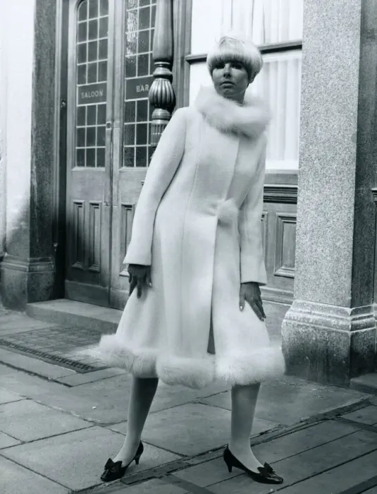 Framed Print : Fashion 1960s Model standing outside Carrot on Wheels boutique wearing a mid-calf