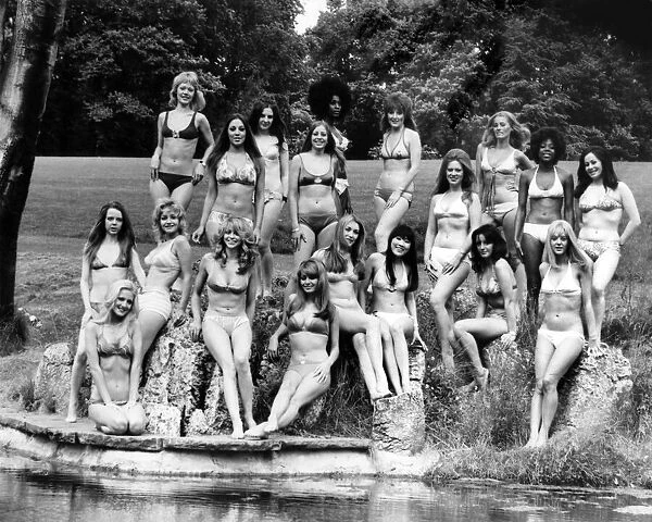 Fashion 1970s. 25th anniversary of the bikini. Group of models show off