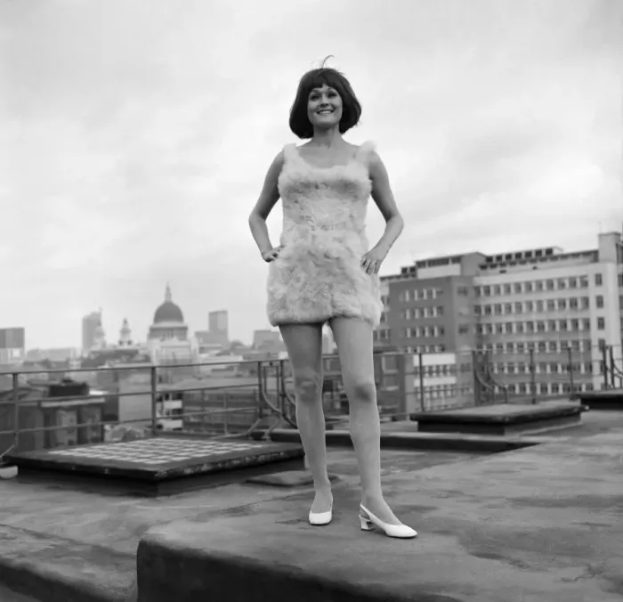 Framed Print : Fashion Clothing. Sue Sampson model girl, 24, in a dress made from poultry feathers in Framed Print : Fashion Clothing. Sue Sampson model girl, 24, in a dress made from poultry feathers in