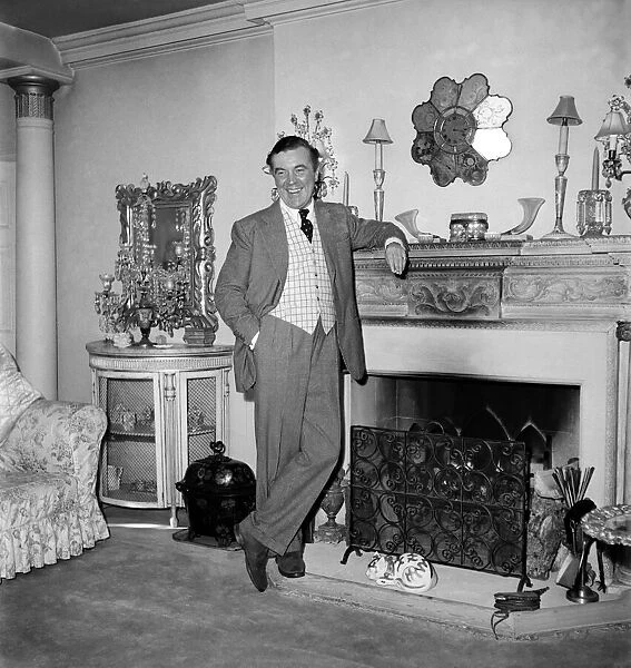 Fashion designer Norman Hartnell. January 1953 D22