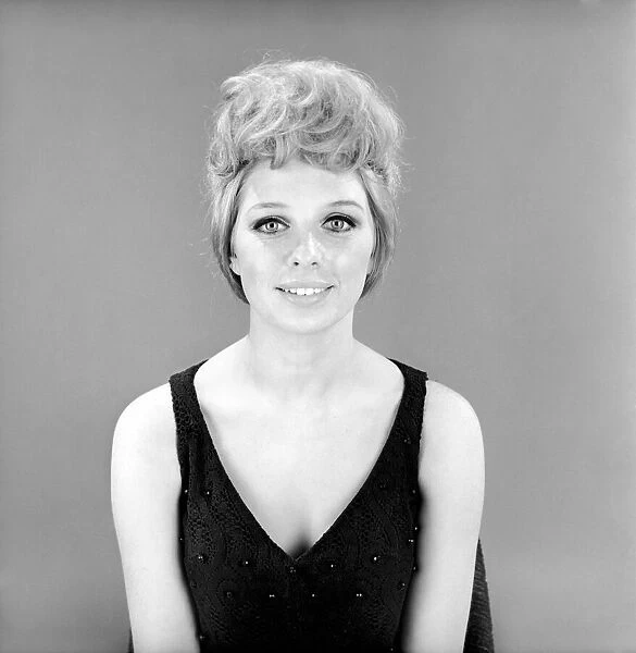 Fashion: Hair styles: Model wearing hair coil fashion item. 1966