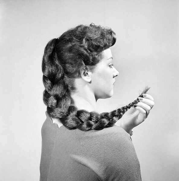 Fashion: Hair styles by Raymond. April 1956 B475-002