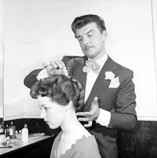 Fashion: Hair styles by Raymond. April 1956 B475-003