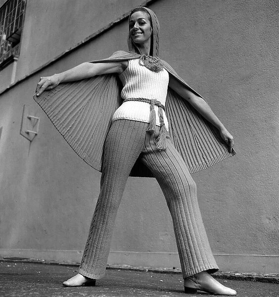 Fashion ICI 1969 Suzanne Gellard in Cape and slacks in Rasberry with sweater in vanilla
