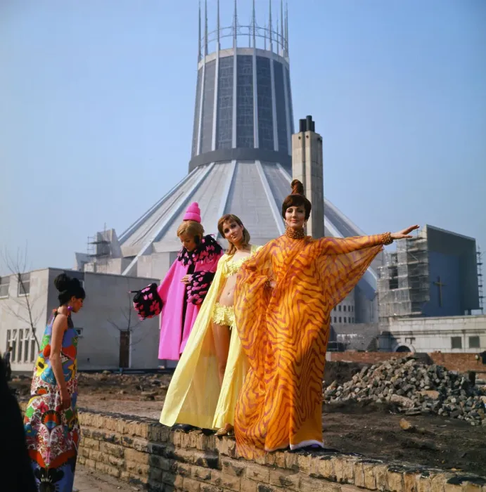 Framed Print : Fashion show in Liverpool. L-R Zandra Fisher, wearing a pink silk coat trimmed with pink Framed Print : Fashion show in Liverpool. L-R Zandra Fisher, wearing a pink silk coat trimmed with pink