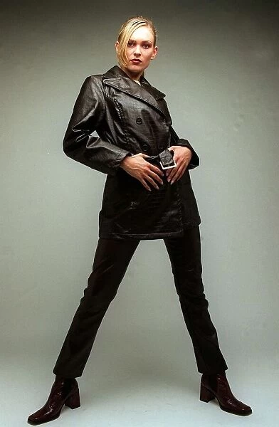 Fashion A model wearing black leather jacket and trousers 1996
