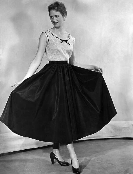 A fashion photograph from December 1953