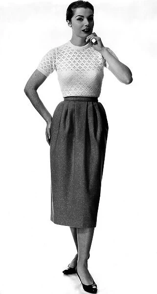 Fashion September 1957 Freckled Model from 1950s wearing a fitted t shirt with a