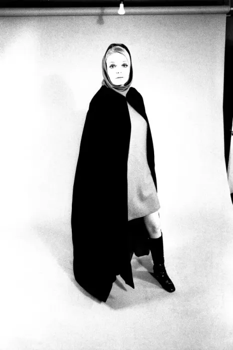 Framed Print : A fashion shoot from 13 April 1970 - A model wears a cloak and knee lenght boots