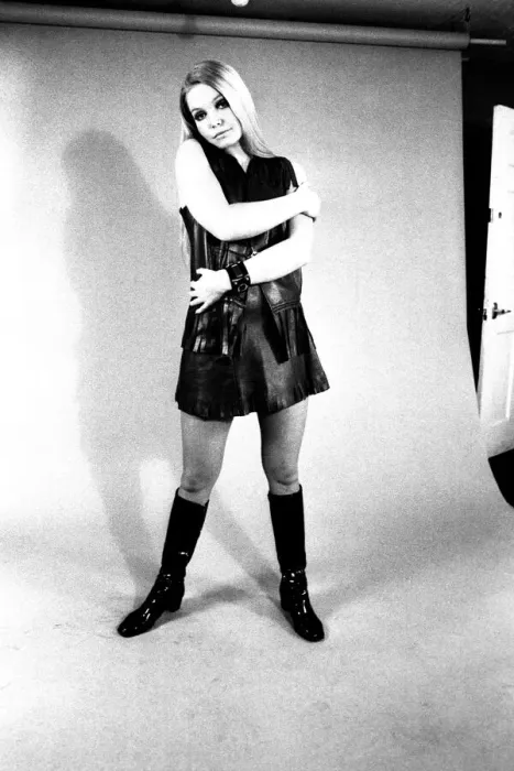 Framed Print : A fashion shoot from 13 April 1970 - A model wears a dress with knee lenght boots