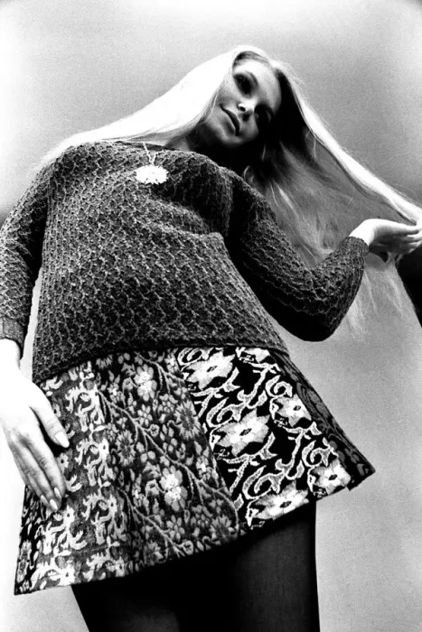 Framed Print : A fashion shoot from 13 April 1970 - A model wears a jumper and skirt