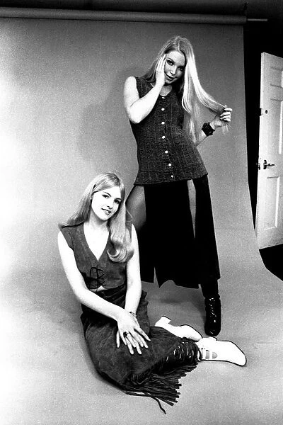 A fashion shoot from 13 April 1970 - Models wear dresses with knee lenght boots
