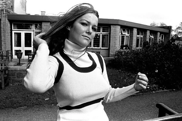 A fashion shoot from 26 October 1971 A model wearing a jumper