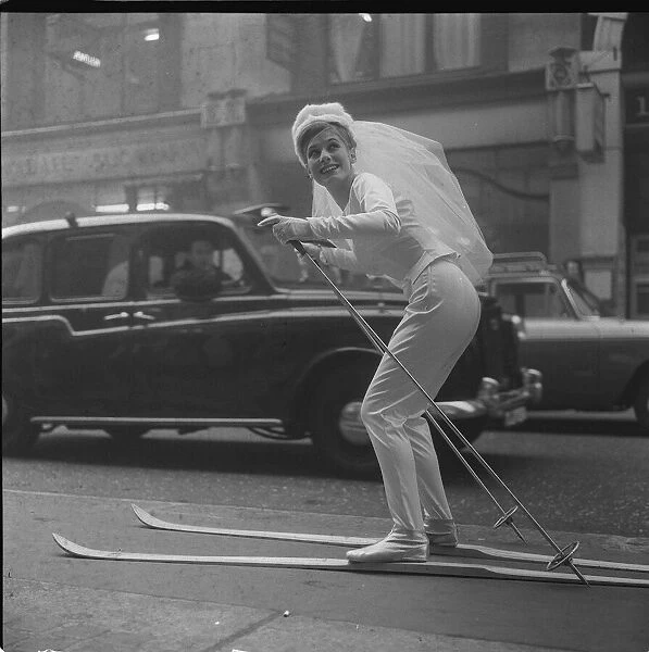 Fashion wedding dress on skis 5  /  12  /  62 A rather unusual method of getting to