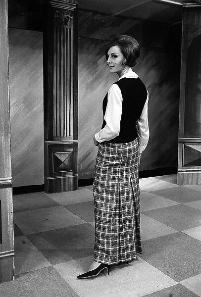Fashions taken during London Fashion Week 1964 Ankle length Plaid skirt with white