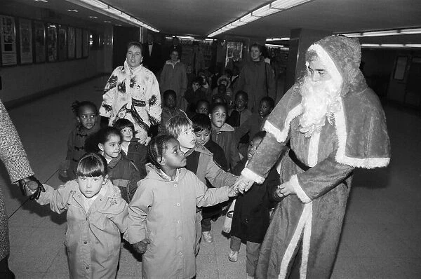 Father Christmas arriving at Snow Hill station yesterday being greeted by enthusiastic