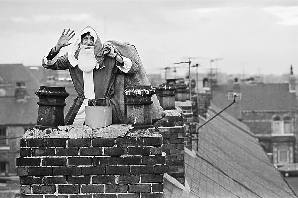 Father Christmas on rooftops, in Middlesbrough. Circa 195