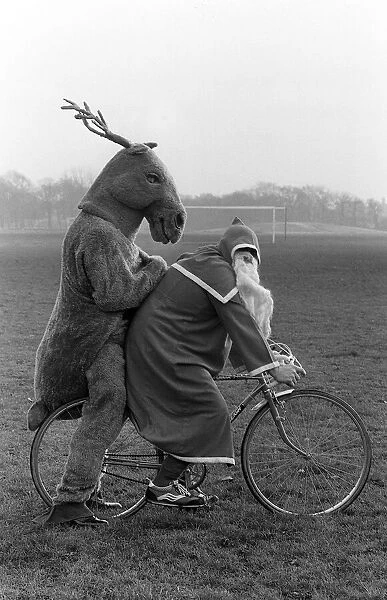 Father Christmas and Rudolf the Reindeer - bike stunt