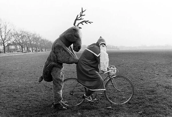 Father Christmas and Rudolf the Reindeer - bike stunt A©Mirrorpix circa 1980
