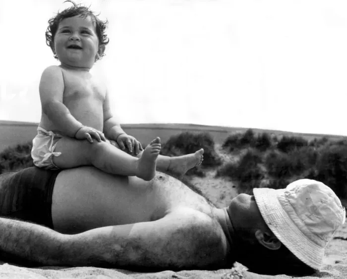 Framed Print : Father and daughter on the beach at Bantham, Devon. 31st May 1954 Framed Print : Father and daughter on the beach at Bantham, Devon. 31st May 1954