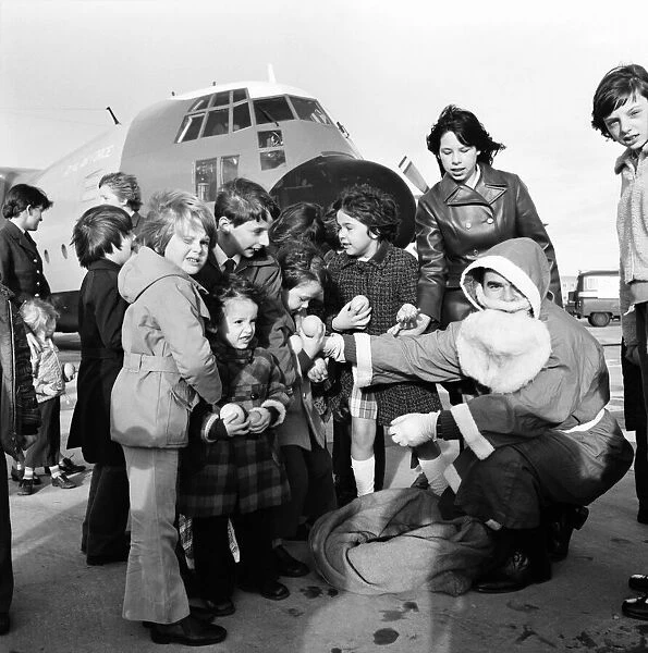Father Xmas with the children of servicemen at R. A. F. Lyneham. December 1974 74-7607-004