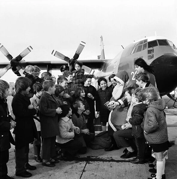 Father Xmas with the children of servicemen at R. A. F. Lyneham. December 1974 74-7607-002
