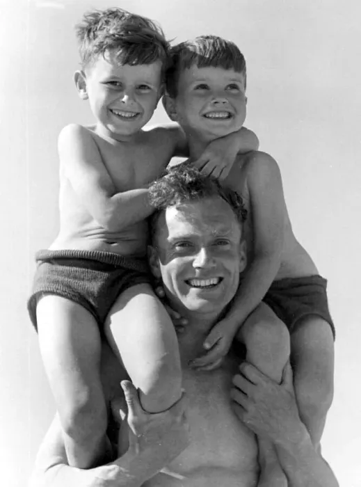 Framed Print : A father with his two young sons sitting on his shoulder Circa 1945 P044436 Framed Print : A father with his two young sons sitting on his shoulder Circa 1945 P044436