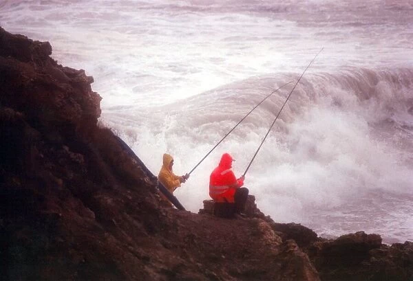 These fearless anglers brave the wild North East weather on Camel Rock, Marsden