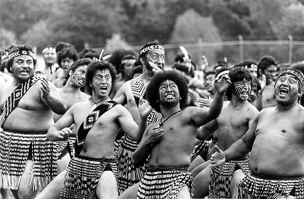 Fearsome Maori warriors put on a traditional dance to welcome Queen Elizabeth II of