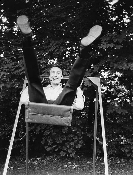 These feet were made for scoring... Jimmy Greaves takes a swing in the England team hotel