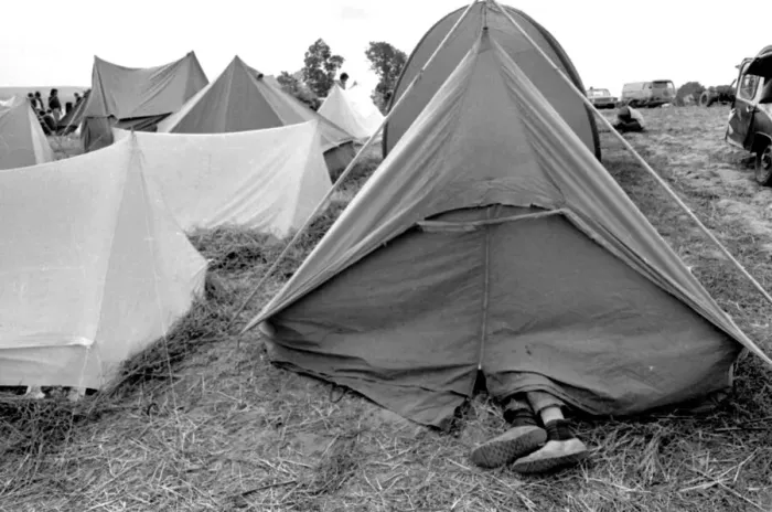 Framed Print : Feet sticking out of a tent at the Isle of Wight Pop Festival 30th August 1969 Framed Print : Feet sticking out of a tent at the Isle of Wight Pop Festival 30th August 1969