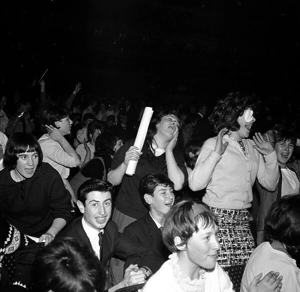 Female Beatles Fans go wild at a concert in Exeter. 14th November 1963
