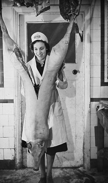 A female butcher working in the South East of England Second World War