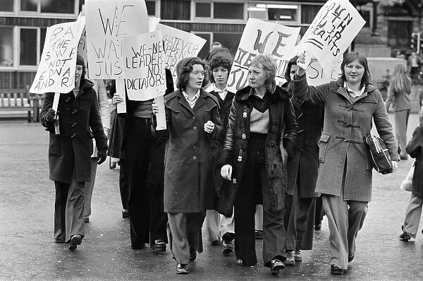 Female football player, Edna Neillis, leads a protest march through Glasgow protesting