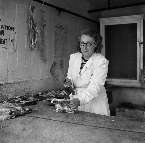 A female worker in a Butchers in Downe. Which is a village in Greater London within