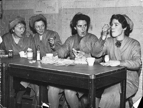 Female workers, possibly munition workers on their break time