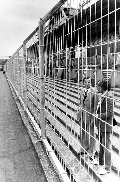 Fenced in - Newcastle United secretary Russell Cushing (left
