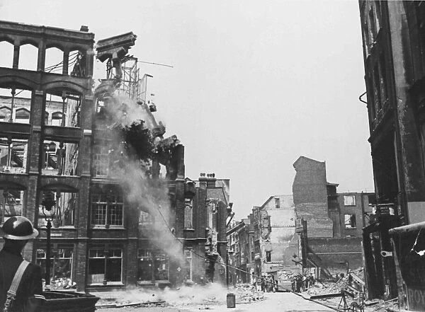 Fetter Lane, off Fleet Street, London. A now unsafe building comes down after being