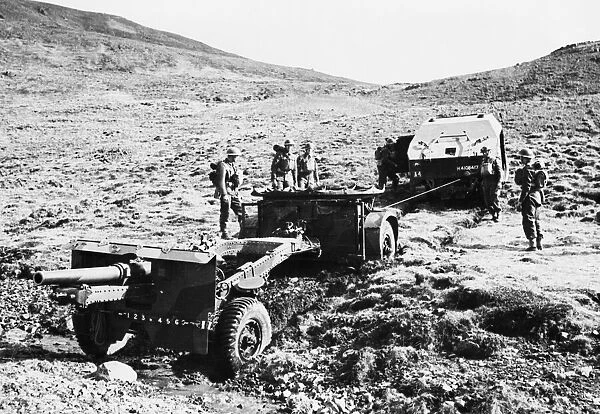 Field gun in Iceland by soldiers Second World War. 11th June 1941