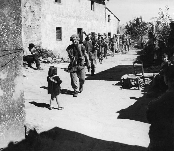Fifth Army patrol returning to platoon HQ in La Vergine, Italy. September 5th 1944