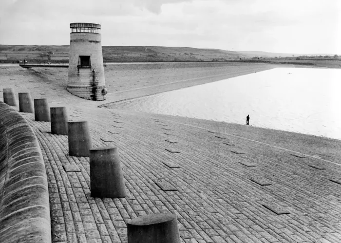 Framed Print : No fighting over pitches at this stretch of water as anglers enjoy a spot of fishing
