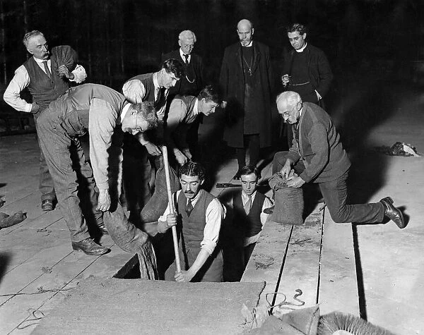 Filling in the Unknown Warriors grave in Westminster Abbey, London