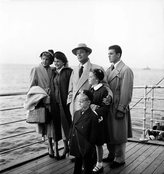 Film actor Alan Ladd and wife Sue and family seen here on the deck of the liner bringing