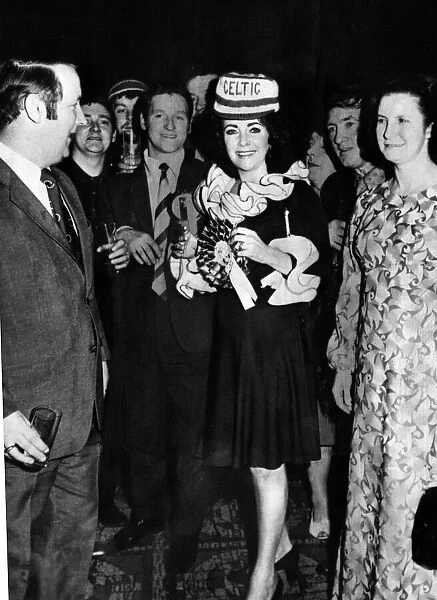 Film actress Elizabeth Taylor, made an honorary Celtic fan after flinging a £